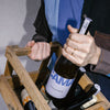 Bouteilles VIBING 75 cl sorties d'une caisse en bois